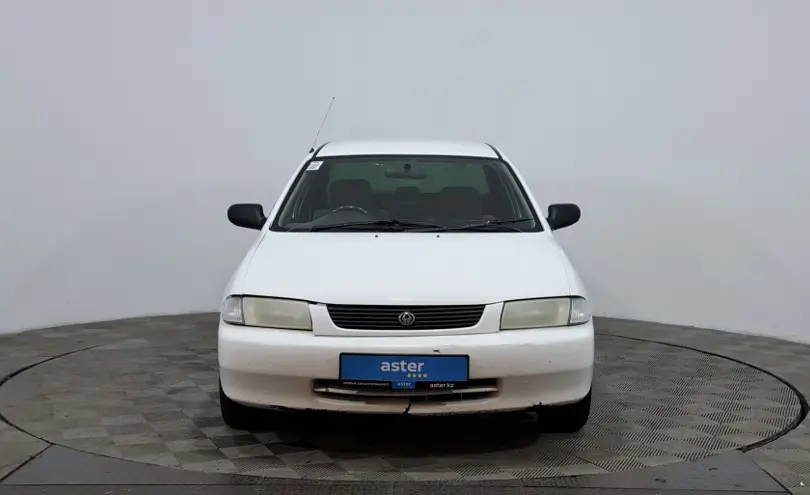 Mazda Familia 1997 года за 850 000 тг. в Астана фото 2