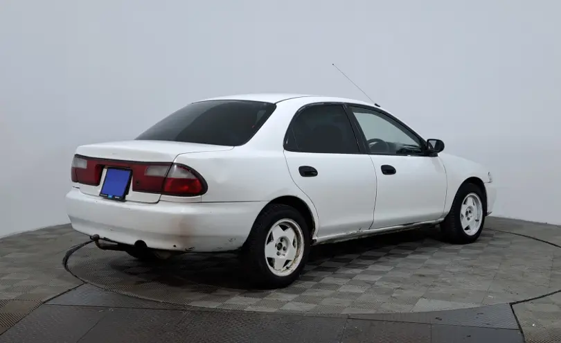 Mazda Familia 1997 года за 850 000 тг. в Астана фото 5
