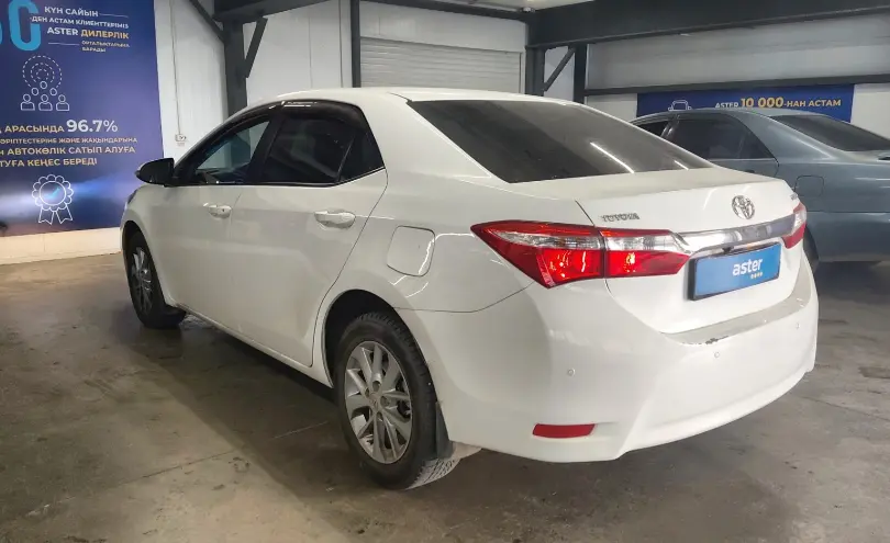 Toyota Corolla 2014 года за 6 490 000 тг. в Астана фото 4