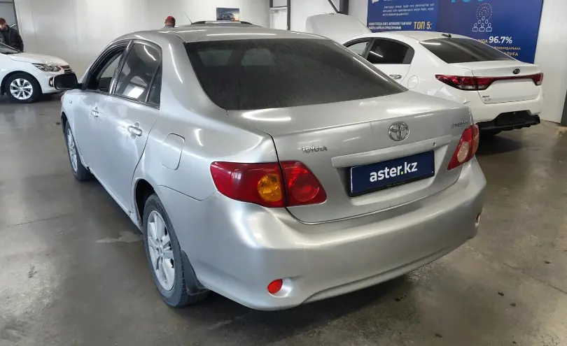Toyota Corolla 2007 года за 2 990 000 тг. в Астана фото 4