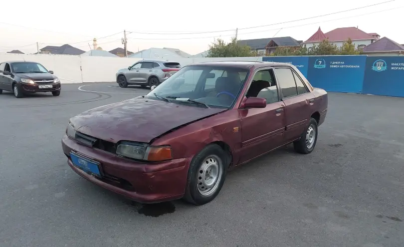 Mazda 323 1994 года за 390 000 тг. в Шымкент фото 1