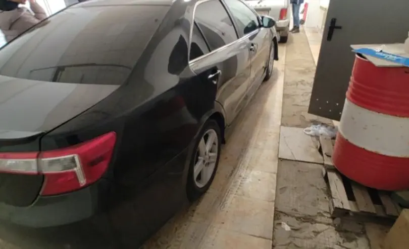 Toyota Camry 2013 года за 7 200 000 тг. в Актобе фото 5