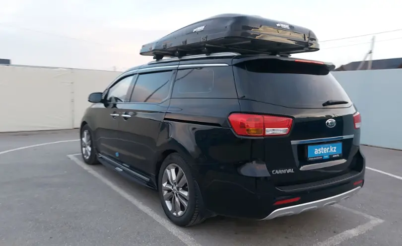 Kia Carnival 2017 года за 12 500 000 тг. в Шымкент фото 4