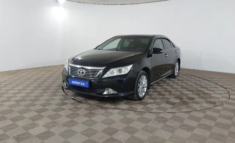 Toyota Camry 2014 года за 9 490 000 тг. в Шымкент