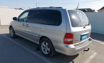 Kia Carnival 2006 года за 4 500 000 тг. в Шымкент фото 4