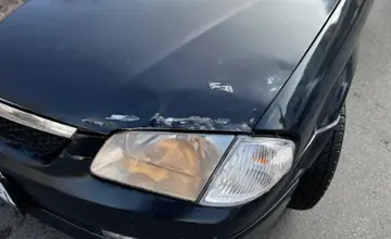 Mazda 323 1998 года за 1 800 000 тг. в Алматы фото 2