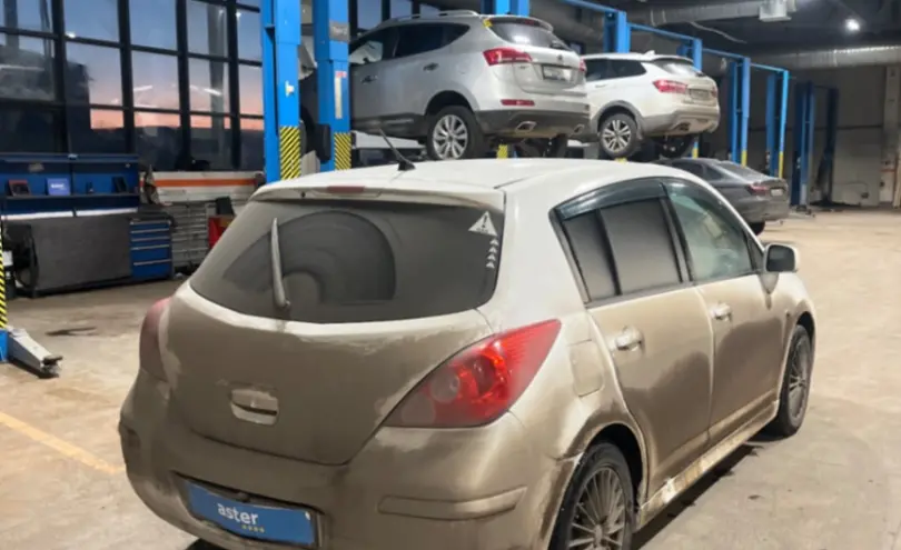 Nissan Tiida 2013 года за 4 500 000 тг. в Караганда фото 5