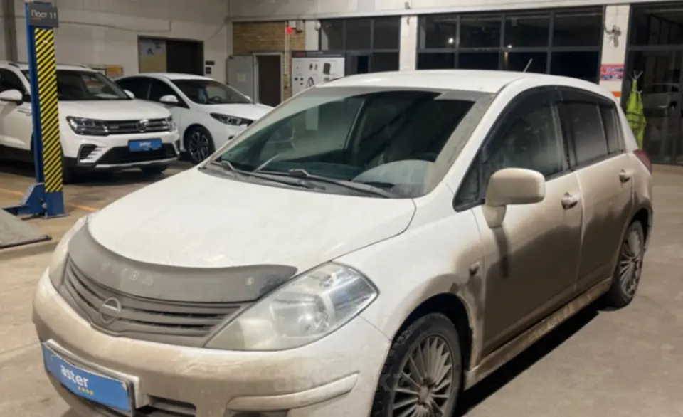 Nissan Tiida 2013 года за 4 500 000 тг. в Караганда