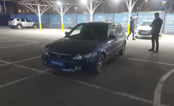 Mazda 323 2001 года за 2 200 000 тг. в Алматы фото 1