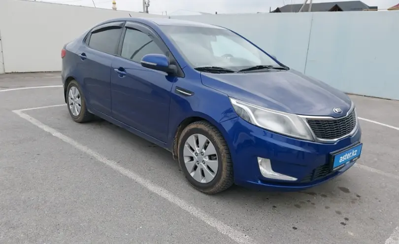 Kia Rio 2013 года за 3 000 000 тг. в Шымкент фото 2
