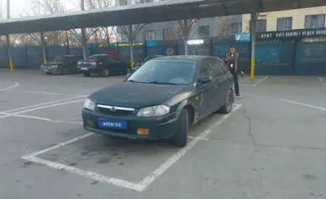 Mazda 323 2001 года за 600 000 тг. в Алматы фото 1