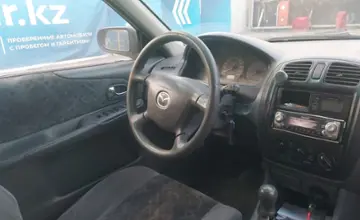 Mazda 323 2001 года за 600 000 тг. в Алматы фото 5