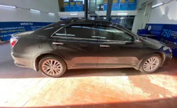 Toyota Camry 2014 года за 9 500 000 тг. в Астана фото 4