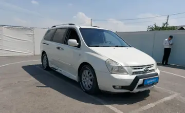 Kia Carnival 2009 года за 4 300 000 тг. в Шымкент фото 2