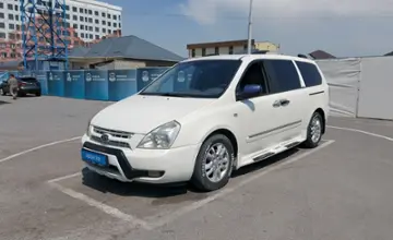 Kia Carnival 2009 года за 4 300 000 тг. в Шымкент фото 1