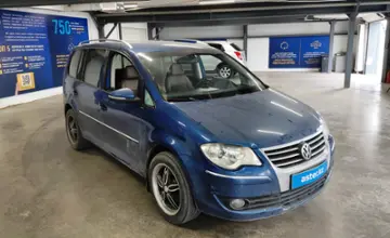 Volkswagen Touran 2009 года за 3 500 000 тг. в Астана фото 2