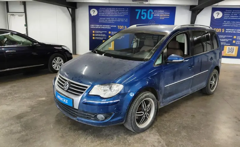 Volkswagen Touran 2009 года за 3 500 000 тг. в Астана