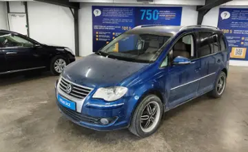 Volkswagen Touran 2009 года за 3 500 000 тг. в Астана фото 1