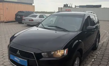 Mitsubishi Outlander 2010 года за 7 500 000 тг. в Караганда фото 1