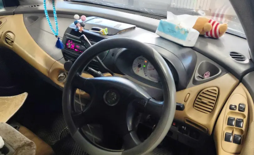 Nissan Tino 1998 года за 1 800 000 тг. в Астана фото 5