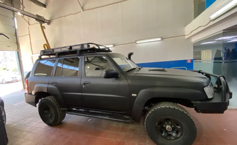 Nissan Patrol 2007 года за 13 000 000 тг. в Астана фото 4