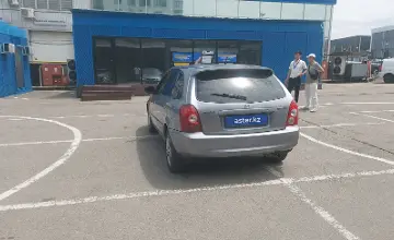 Mazda 323 2002 года за 1 890 000 тг. в Алматы фото 4
