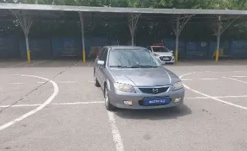 Mazda 323 2002 года за 1 890 000 тг. в Алматы фото 2
