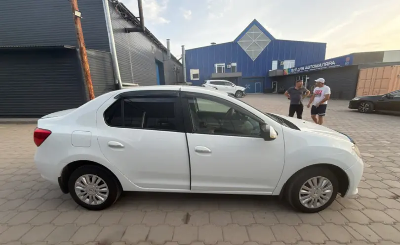 Renault Logan 2017 года за 4 300 000 тг. в Караганда фото 4