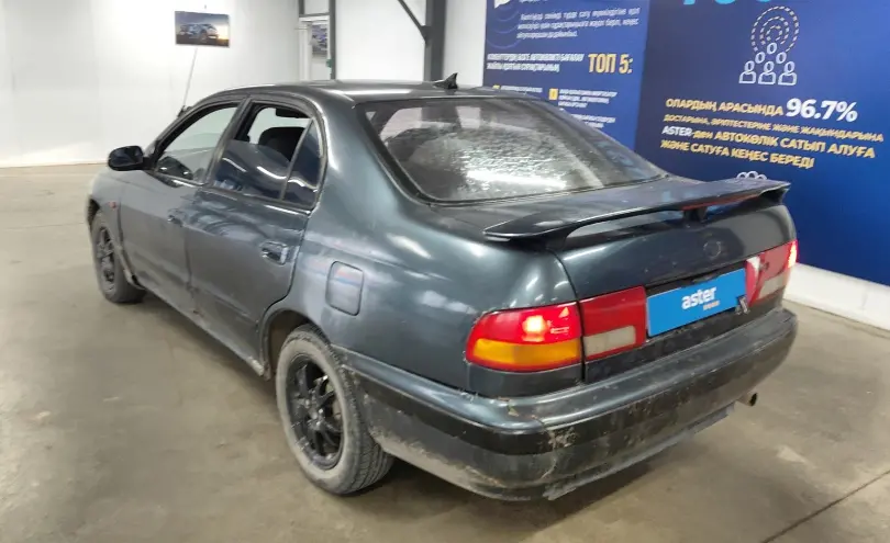 Toyota Carina 1997 года за 600 000 тг. в Астана фото 4
