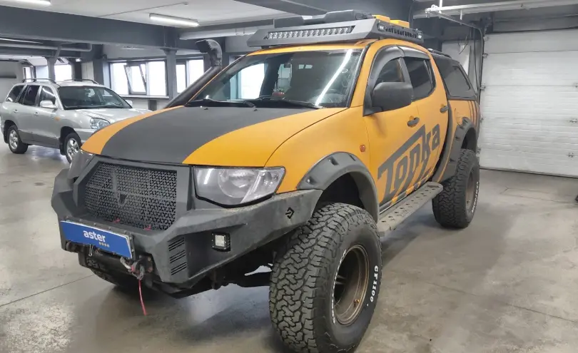 Mitsubishi L200 2008 года за 15 000 000 тг. в Астана