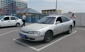 Mazda 626 1995 года за 900 000 тг. в Шымкент фото 1