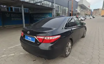 Toyota Camry 2014 года за 10 000 000 тг. в Караганда