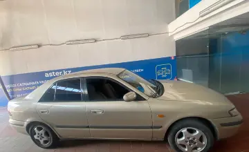 Mazda 626 1998 года за 1 200 000 тг. в Астана фото 4