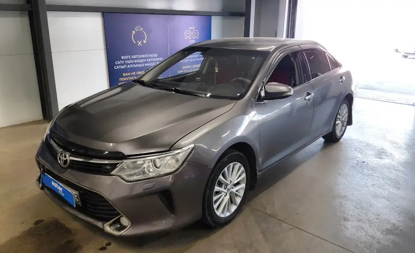 Toyota Camry 2015 года за 8 290 000 тг. в Астана