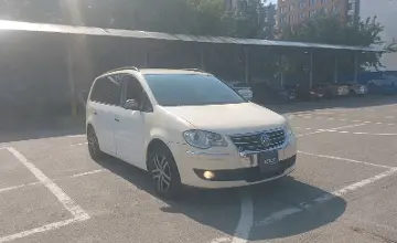 Volkswagen Touran 2010 года за 4 000 000 тг. в Алматы фото 2