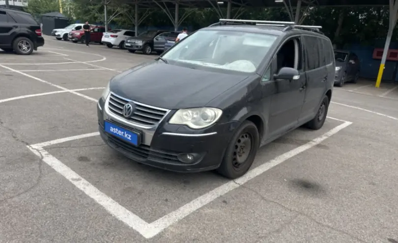 Volkswagen Touran 2010 года за 4 900 000 тг. в Алматы