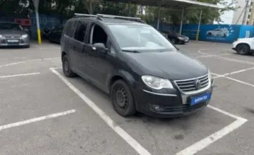 Volkswagen Touran 2010 года за 4 900 000 тг. в Алматы фото 2