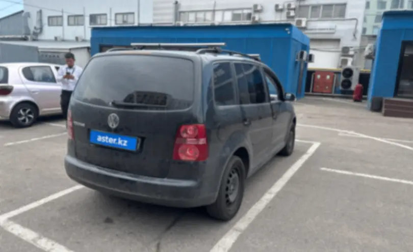 Volkswagen Touran 2010 года за 4 900 000 тг. в Алматы фото 3