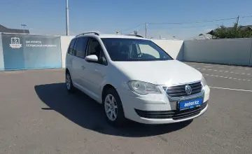 Volkswagen Touran 2009 года за 4 500 000 тг. в Шымкент фото 2