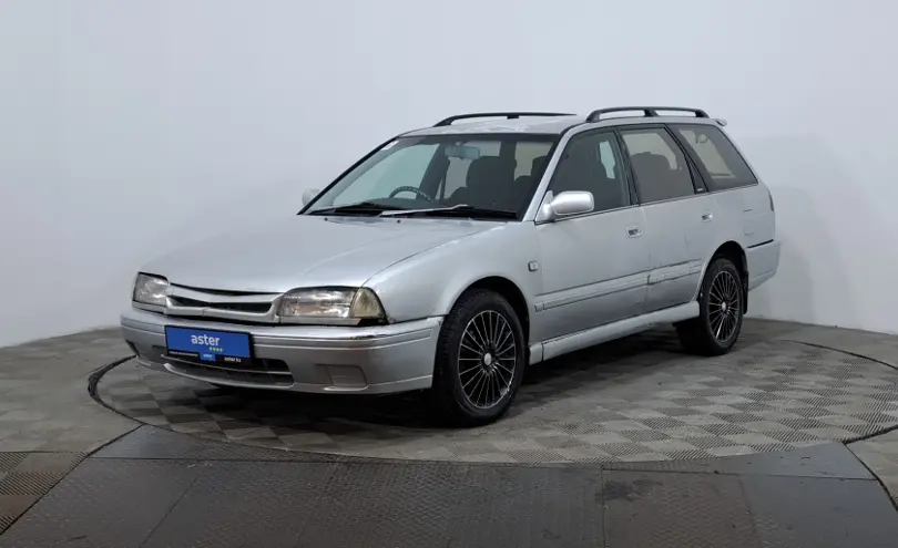 Nissan Avenir 1996 года за 990 000 тг. в Астана фото 1