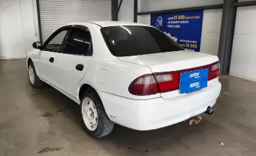 Mazda Familia 1997 года за 990 000 тг. в Астана фото 4