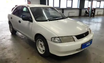 Mazda Familia 1997 года за 990 000 тг. в Астана фото 2
