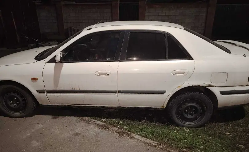 Mazda 626 1998 года за 650 000 тг. в Астана фото 4