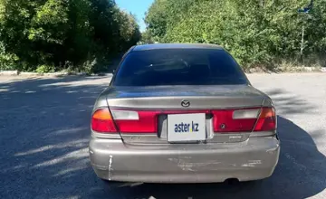 Mazda 323 1998 года за 600 000 тг. в Карагандинская область фото 2