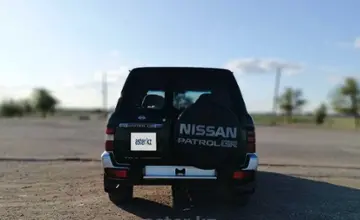 Nissan Patrol 2000 года за 6 000 000 тг. в Караганда фото 2