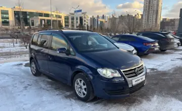 Volkswagen Touran 2008 года за 4 000 000 тг. в Астана фото 3