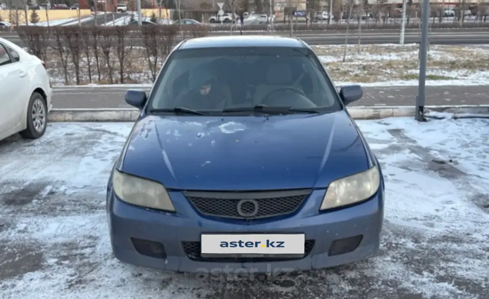 Mazda 323 2001 года за 2 300 000 тг. в Астана фото 2