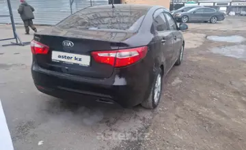Kia Rio 2014 года за 4 800 000 тг. в Караганда фото 4