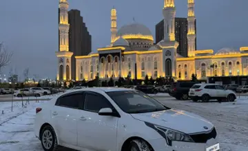 Kia Rio 2021 года за 7 400 000 тг. в Астана