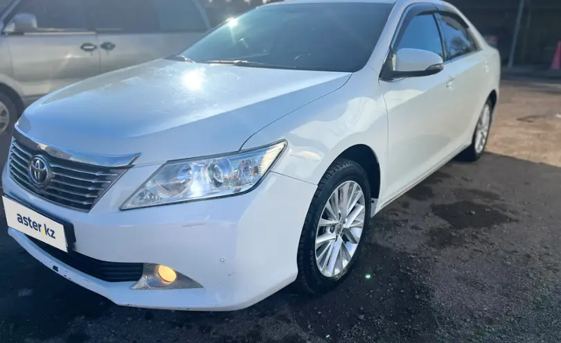 Toyota Camry 2014 года за 8 400 000 тг. в Караганда